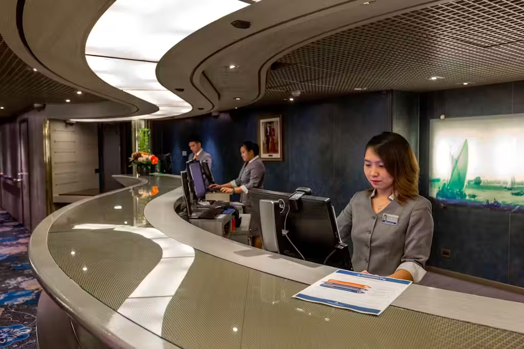 Crew members working on a cruise ship